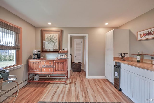 3332 Sherwood Rd, Palmer Twp, PA 18045 - interior space featuring light wood finished floors, wine cooler, baseboards, and recessed lighting