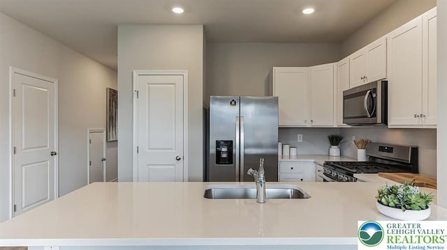 1207 Susan Cir, Upper Macungie Twp, PA 18031 - kitchen with light countertops, appliances with stainless steel finishes, recessed lighting, and a sink