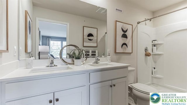 1207 Susan Cir, Upper Macungie Twp, PA 18031 - full bathroom with toilet, a sink, visible vents, and double vanity