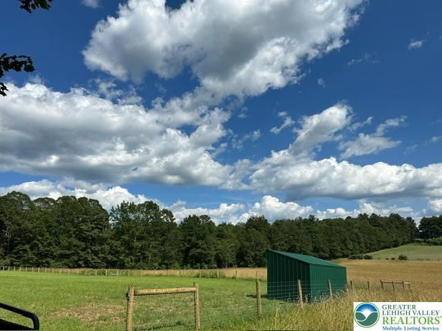 376 Hty Rd, Polk Twp, PA 18058 - view of green lawn with a view of countryside and a wooded view