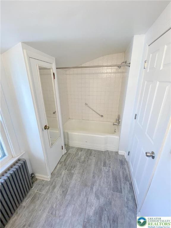 1226 Ferry St, Easton, PA 18042 - full bath with radiator, baseboards, shower / bathtub combination, and wood finished floors