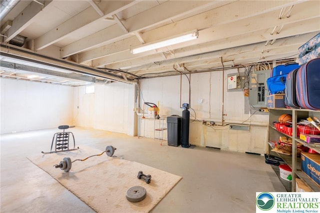 unfinished basement with electric panel