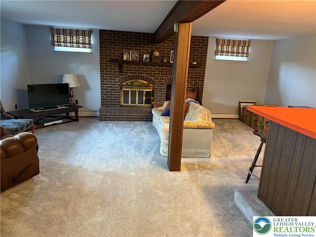 carpeted living room featuring a brick fireplace