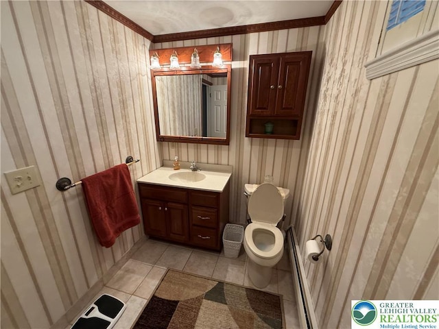 bathroom with tile patterned floors, toilet, vanity, and wallpapered walls