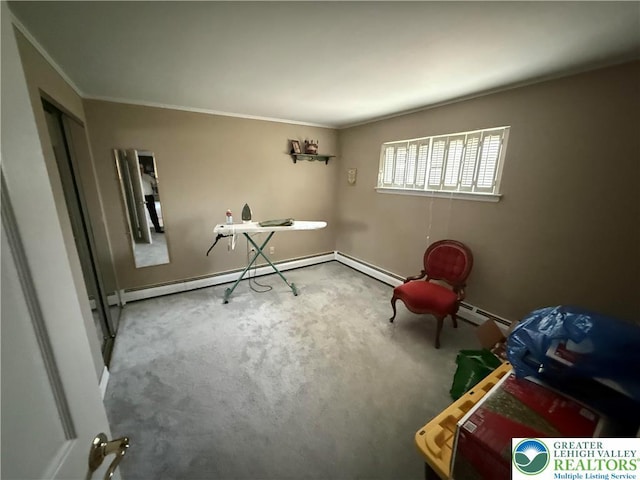 unfurnished office featuring baseboards, ornamental molding, carpet floors, and a baseboard radiator