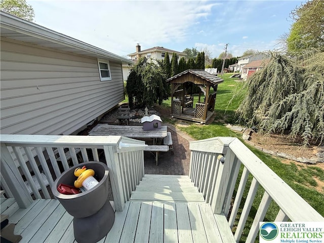 wooden terrace with a gazebo
