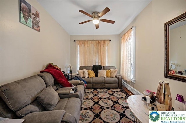 living room with wood finished floors and ceiling fan