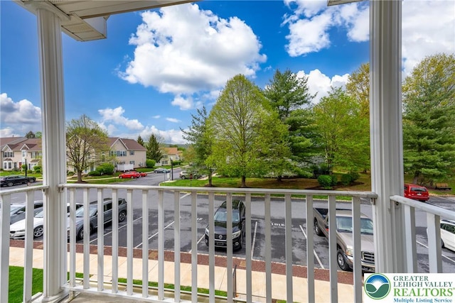 balcony featuring a residential view