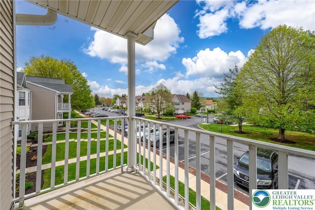 balcony featuring a residential view