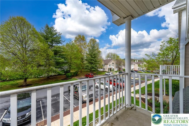 balcony featuring a residential view