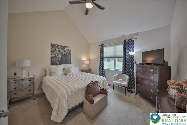 bedroom with carpet, ceiling fan, and high vaulted ceiling