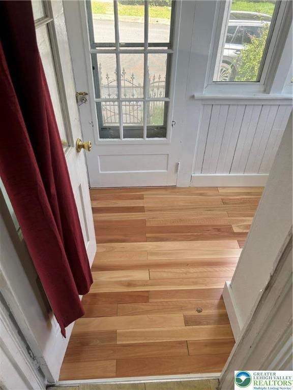 stairs with wood finished floors