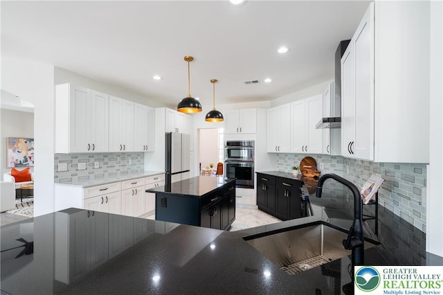 901 Meyer Rd, Bushkill Twp, PA 18064 - kitchen with freestanding refrigerator, double wall oven, a sink, tasteful backsplash, and recessed lighting