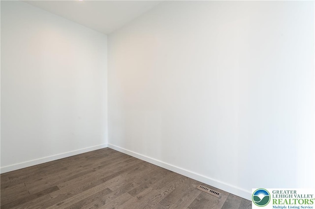 901 Meyer Rd, Bushkill Twp, PA 18064 - empty room featuring baseboards and dark wood finished floors