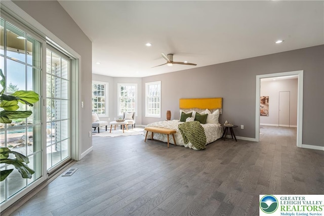 bedroom featuring recessed lighting, visible vents, access to outside, and wood finished floors