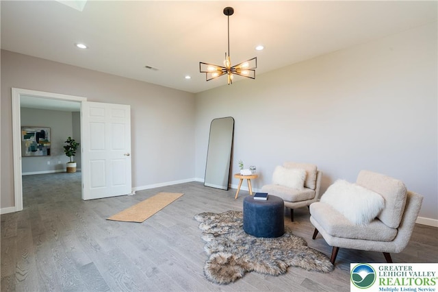 901 Meyer Rd, Bushkill Twp, PA 18064 - sitting room featuring a chandelier, wood finished floors, baseboards, and recessed lighting