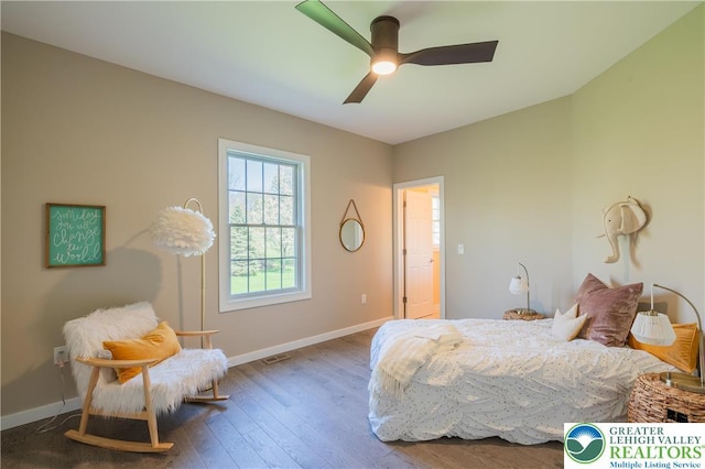 bedroom featuring ceiling fan, wood finished floors, and baseboards