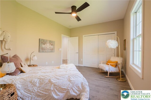 901 Meyer Rd, Bushkill Twp, PA 18064 - bedroom with wood finished floors, a closet, baseboards, and a ceiling fan
