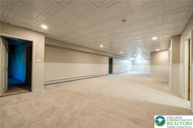 901 Meyer Rd, Bushkill Twp, PA 18064 - finished basement featuring a baseboard heating unit, carpet, a wainscoted wall, and recessed lighting