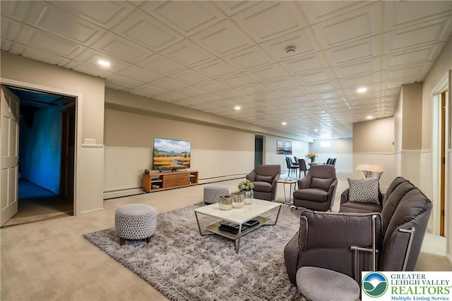 901 Meyer Rd, Bushkill Twp, PA 18064 - living area featuring a baseboard heating unit, wainscoting, recessed lighting, and light colored carpet