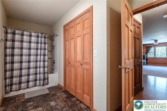 entrance foyer featuring baseboards and a ceiling fan