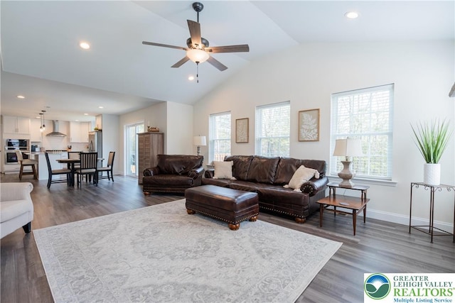 131 Chinaberry Way, Polk Twp, PA 18058 - living room with ceiling fan, vaulted ceiling, plenty of natural light, and wood finished floors