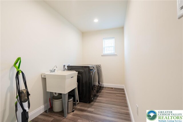 131 Chinaberry Way, Polk Twp, PA 18058 - clothes washing area featuring laundry area, wood finished floors, baseboards, recessed lighting, and separate washer and dryer