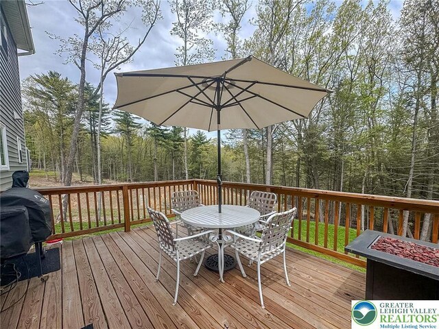 131 Chinaberry Way, Polk Twp, PA 18058 - wooden terrace with outdoor dining space and a grill