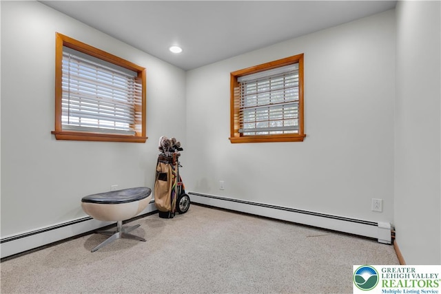 interior space featuring baseboards, recessed lighting, carpet, and a baseboard heating unit
