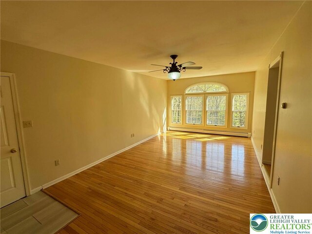 91 Alpine Dr, Jim Thorpe Boro, PA 18229 - spare room with a baseboard heating unit, light wood finished floors, and ceiling fan
