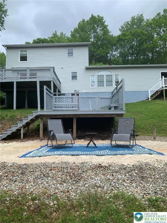 91 Alpine Dr, Jim Thorpe Boro, PA 18229 - rear view of property with stairway, a deck, and a patio