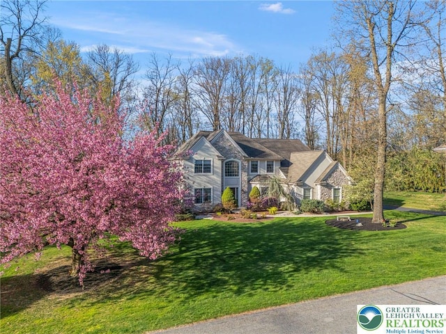 view of front of property with a front yard