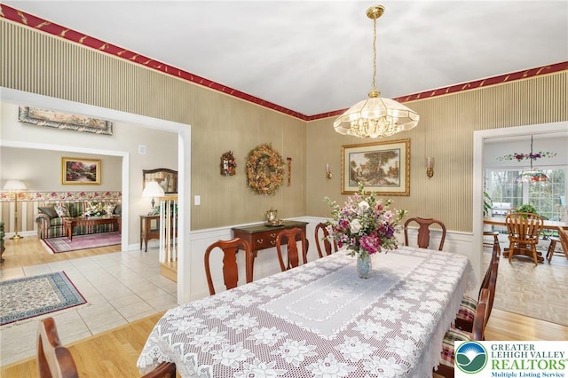 dining room with a chandelier