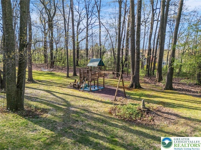 8750 Summit Cir, Weisenberg Twp, PA 18051 - view of play area featuring a lawn