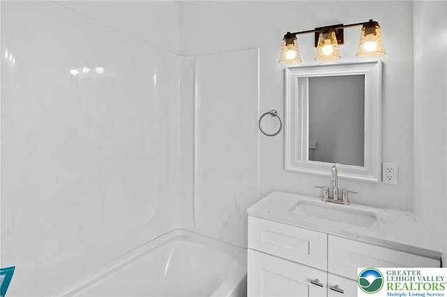 full bathroom with vanity and  shower combination