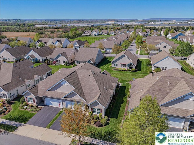 drone / aerial view featuring a residential view