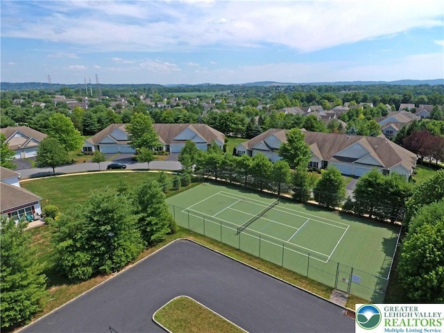 birds eye view of property with a residential view