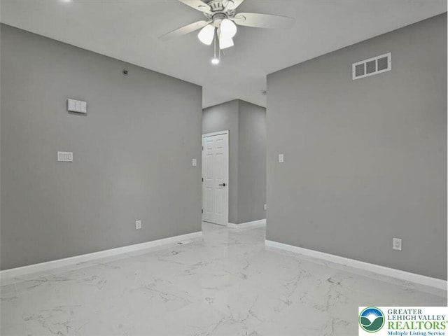 empty room featuring a ceiling fan, visible vents, baseboards, marble finish floor, and recessed lighting