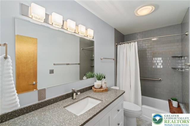 full bath featuring vanity, shower / bath combo, and toilet