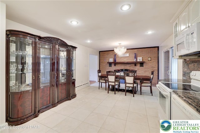 dining area with an inviting chandelier, baseboard heating, recessed lighting, and light tile patterned flooring