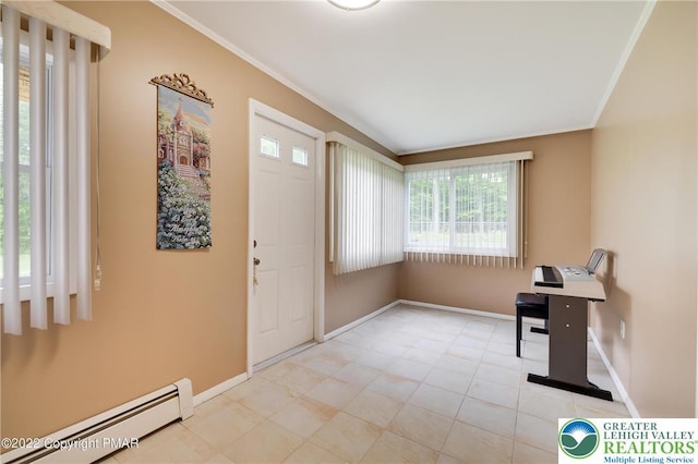 foyer entrance featuring crown molding, baseboards, and a baseboard radiator