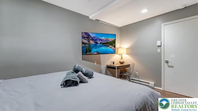 bedroom with lofted ceiling with beams, recessed lighting, baseboards, wood finished floors, and a baseboard radiator