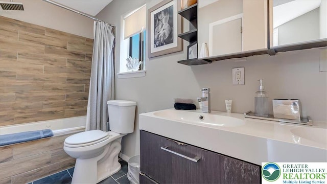 full bath with visible vents, tile patterned flooring, vanity, toilet, and shower / bathtub combination with curtain