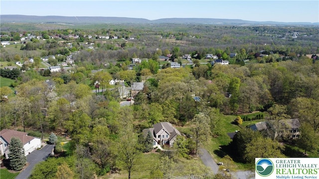 drone / aerial view with a forest view