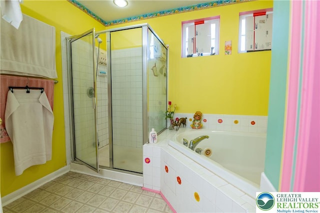 full bath featuring a shower stall and a bath