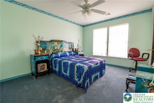 carpeted bedroom featuring baseboards, a ceiling fan, and visible vents