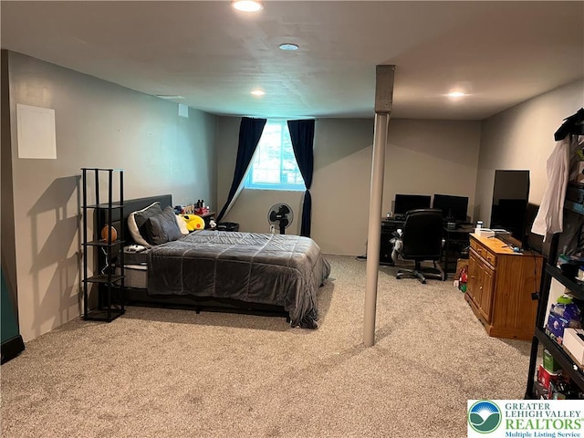 bedroom with recessed lighting and light carpet