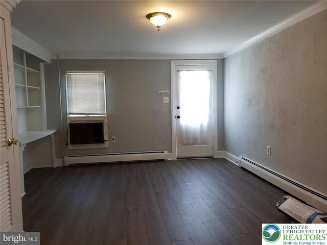entrance foyer with ornamental molding, dark wood finished floors, and baseboard heating