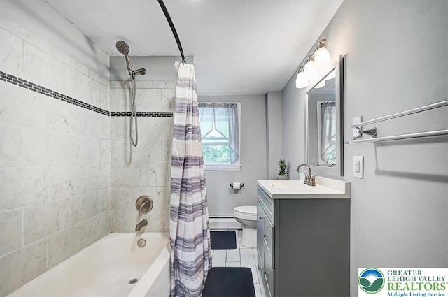 full bath featuring vanity, toilet, tile patterned floors, a baseboard radiator, and shower / bath combo