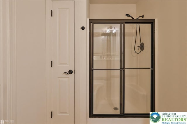 bathroom with a stall shower